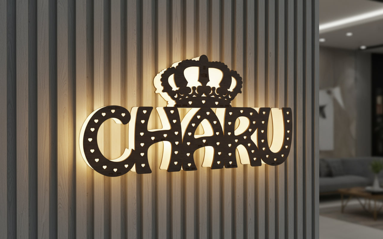 Decorative letters spelling 'CHARU' with a crown on a glass surface.