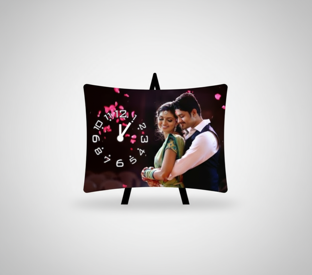 Decorative pillow with a clock and a couple on a stand