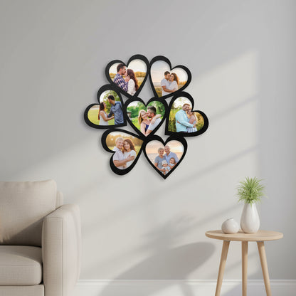Heart-shaped photo collage frame with multiple heart cutouts on a white background