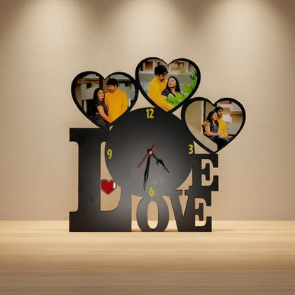 Decorative clock with heart-shaped cutouts and 'LOVE' text on a textured wall.