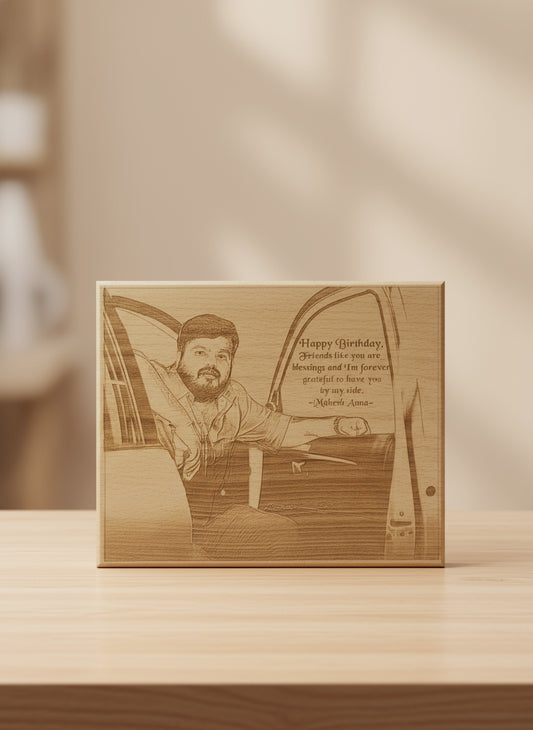 Wooden birthday card with engraved illustration and text, held in front of a colorful background.