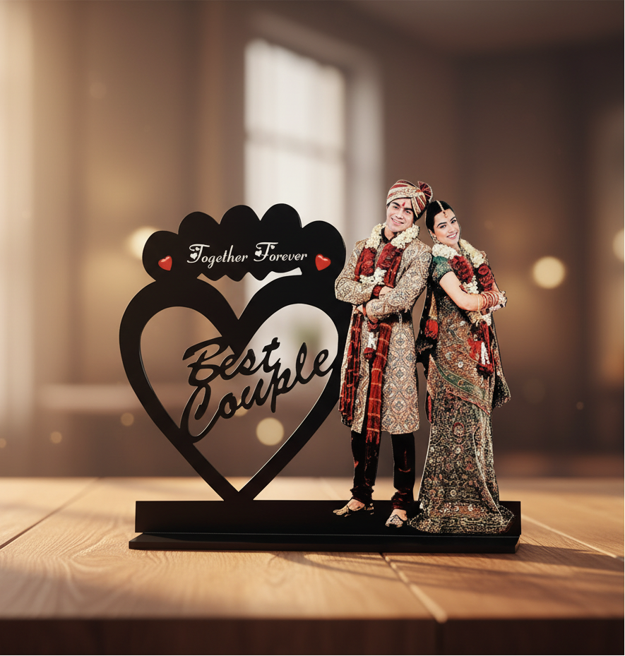 Decorative stand with a heart and 'Together Forever Best Couple' text, featuring two people in traditional attire.